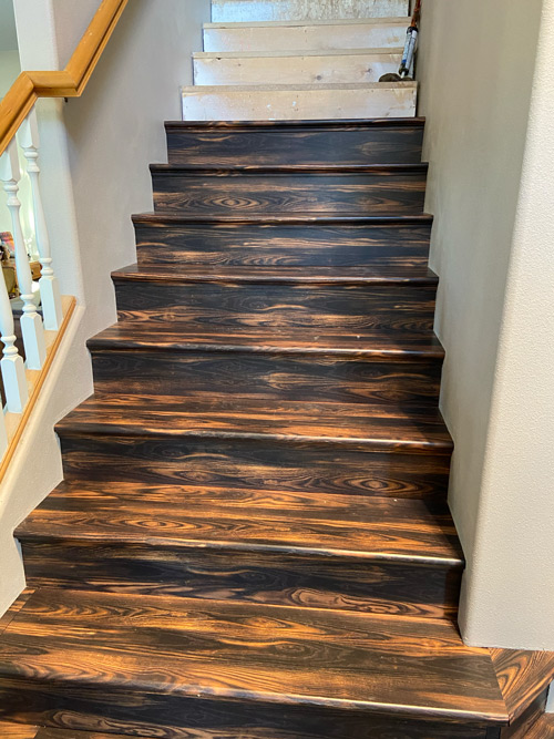 Picture of laminate flooring on stairs.