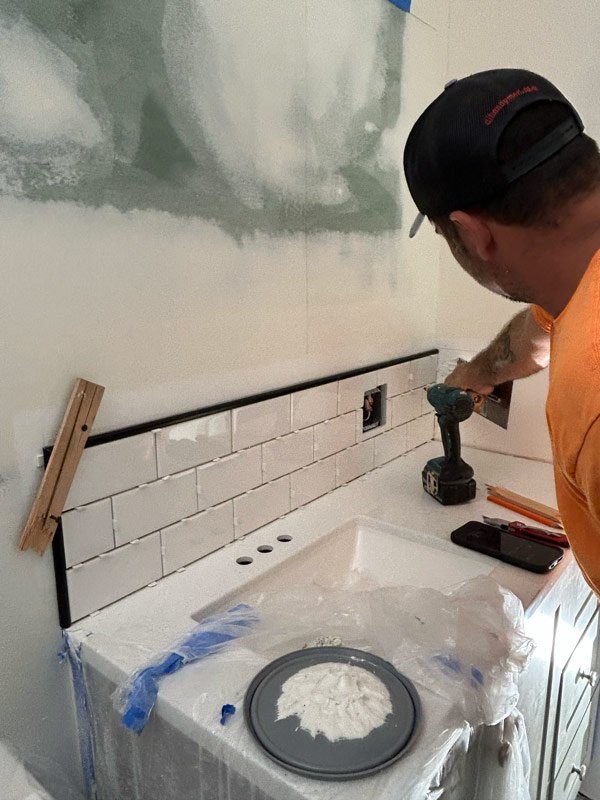 South Hill bathroom remodel back splash installation.