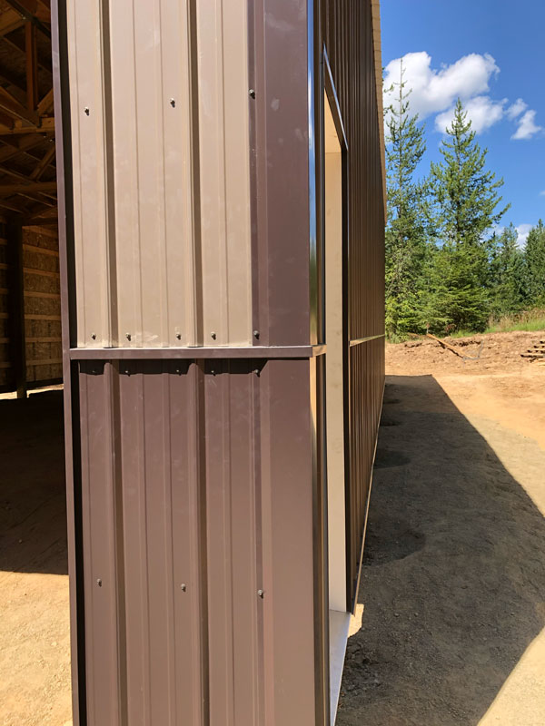 Pole barn with wainscoting.