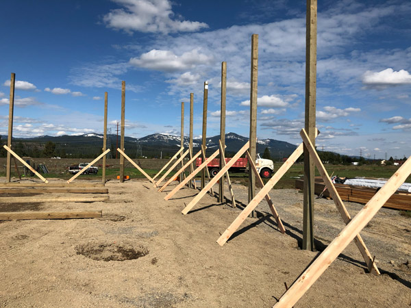 Spokane Valley pole barn post setting.