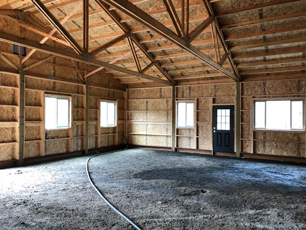 Post framed house interior framing view.