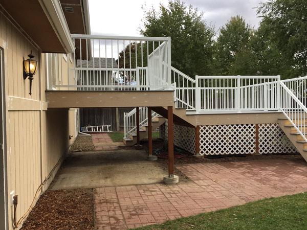 Proper caulking prep being done on house and deck for exterior painting to be done.
