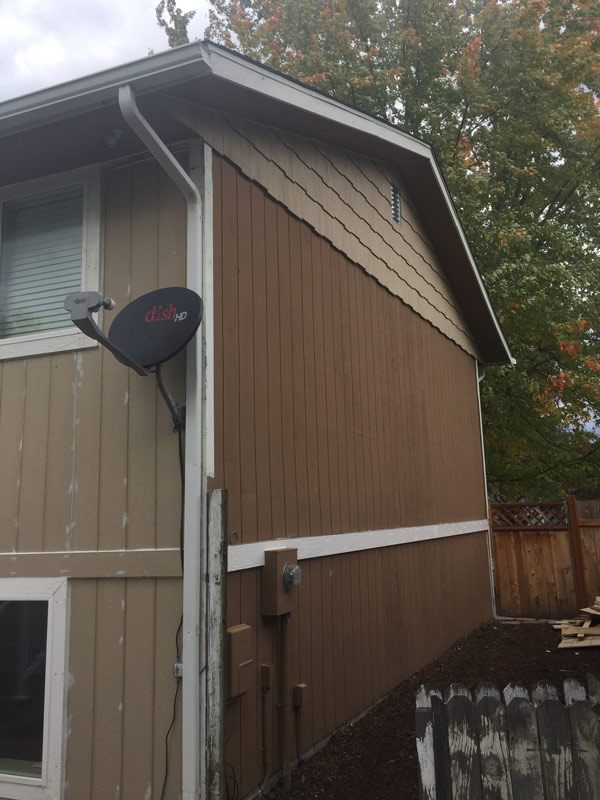 A comparison photo of exterior house being painted in shiloh hills neighborhood.