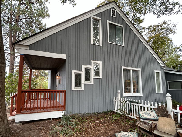 Exterior staining and fresh exterior trim painting on house in the cliff cannon neighborhood.